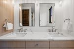 His & her sinks with oversized mirror 